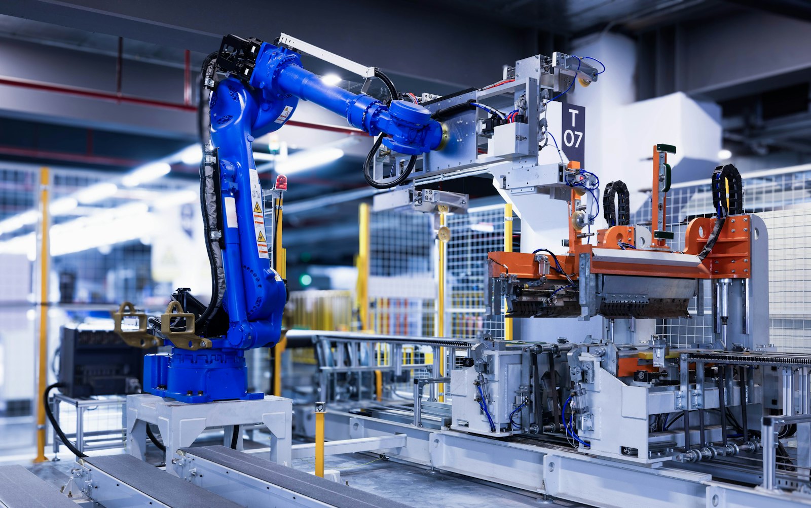 Industrial robot arm on a factory floor
